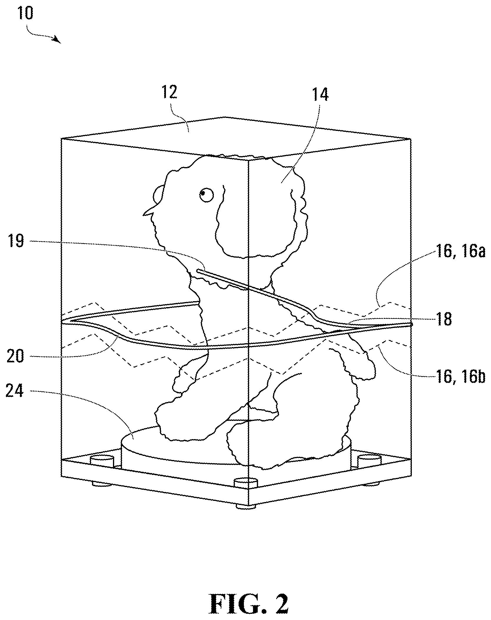 Patent US12102932 Figure 2 – Assembly with inner object in housing that breaks out of housing