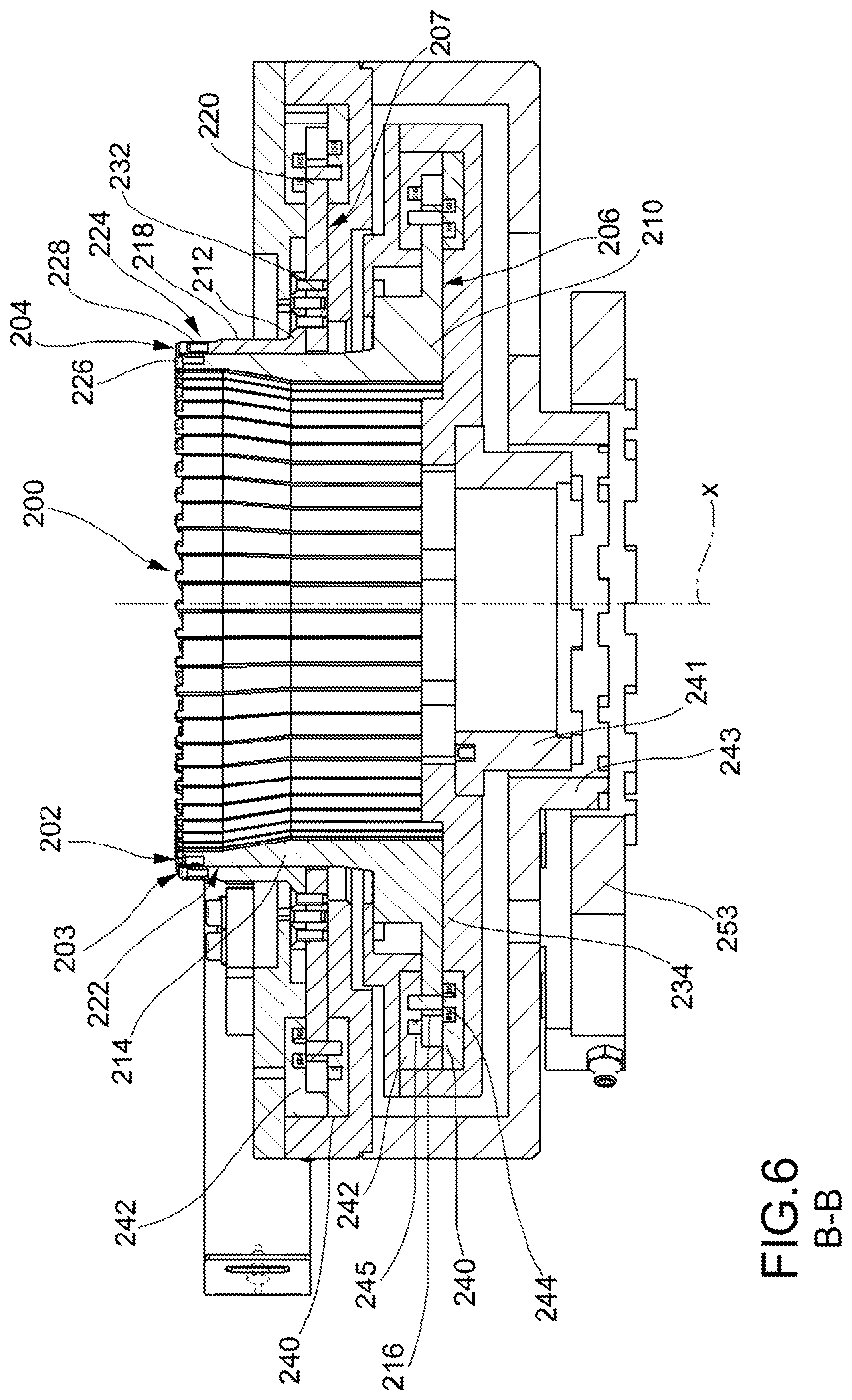 Patent US12348090 Figure 4 – Apparatus for deforming conductors protruding from a side of a stator or of a rotor of an electric machine