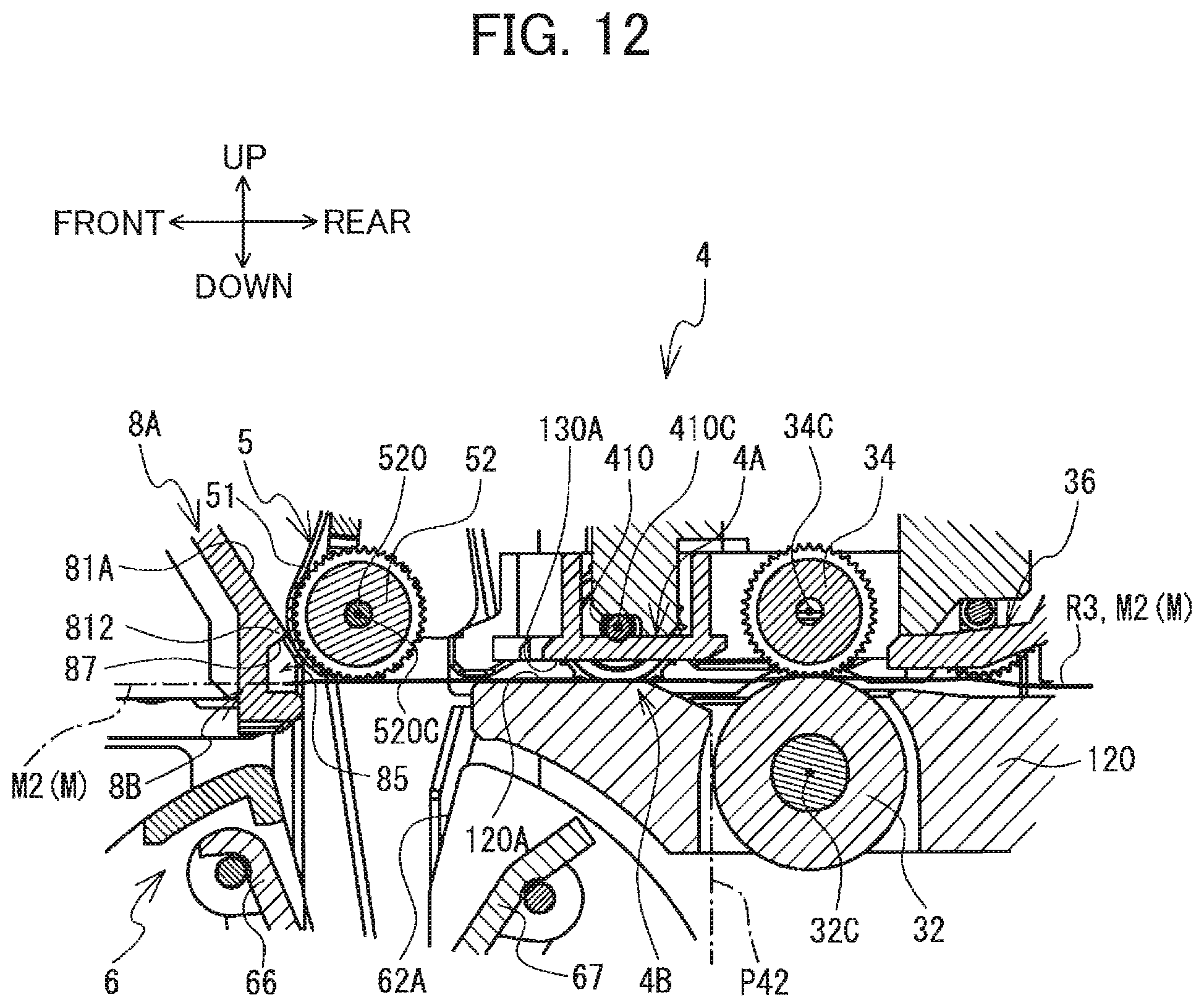 Patent US12351355 Figure 12 – Label wrapping device including first and second members arranged to partially overlap each other in width direction of label to correct curling tendency of label
