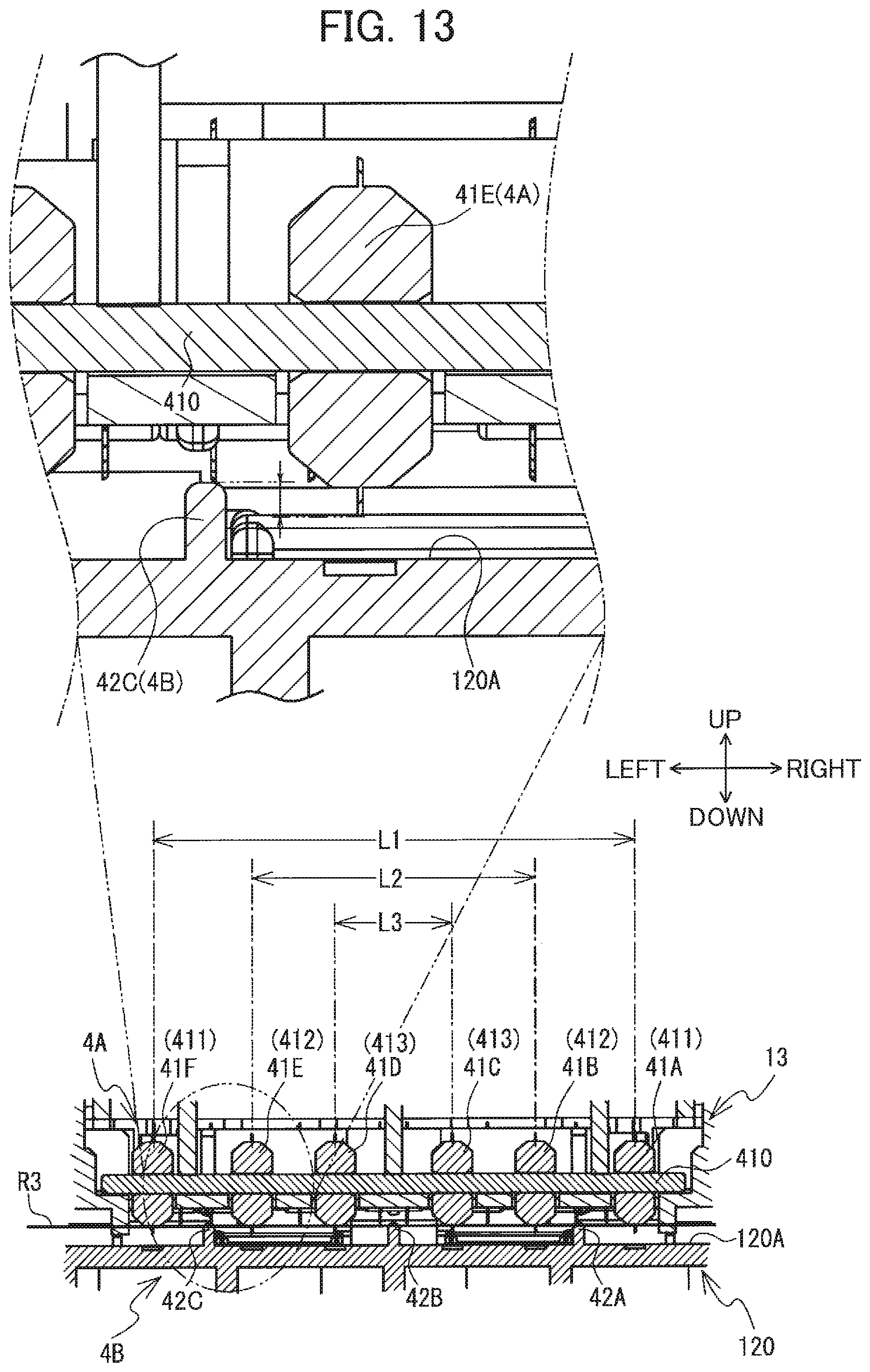 Patent US12351355 Figure 13 – Label wrapping device including first and second members arranged to partially overlap each other in width direction of label to correct curling tendency of label