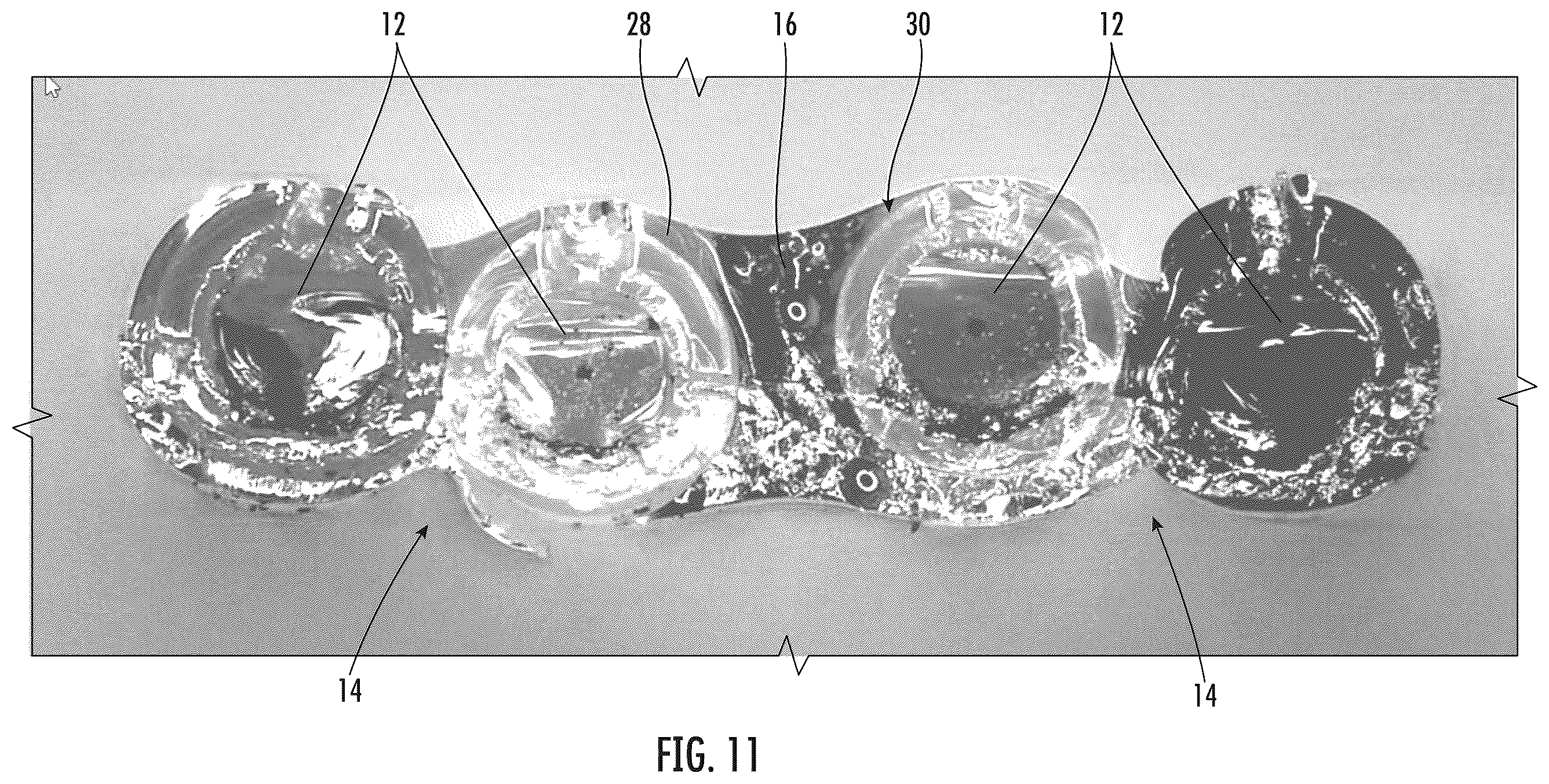 Patent US12353041 Figure 9 – Intermittently bonded ribbon with intermittent bonds created with a wet-on-wet process