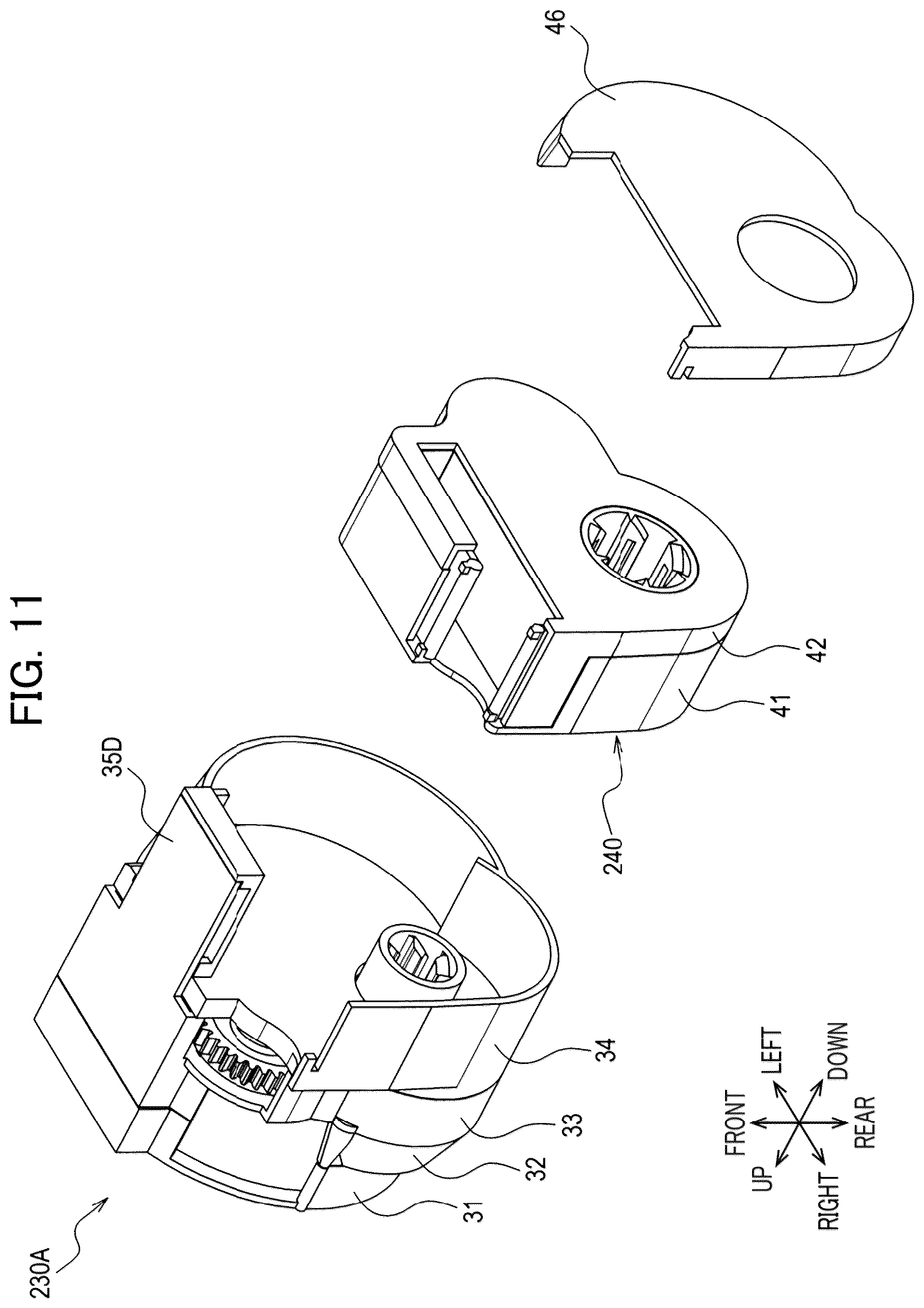 Patent US12496844 Figure 11 – Auxiliary tape cassette provided with case having guide surface around which printing tape is wrapped to form spiral portion