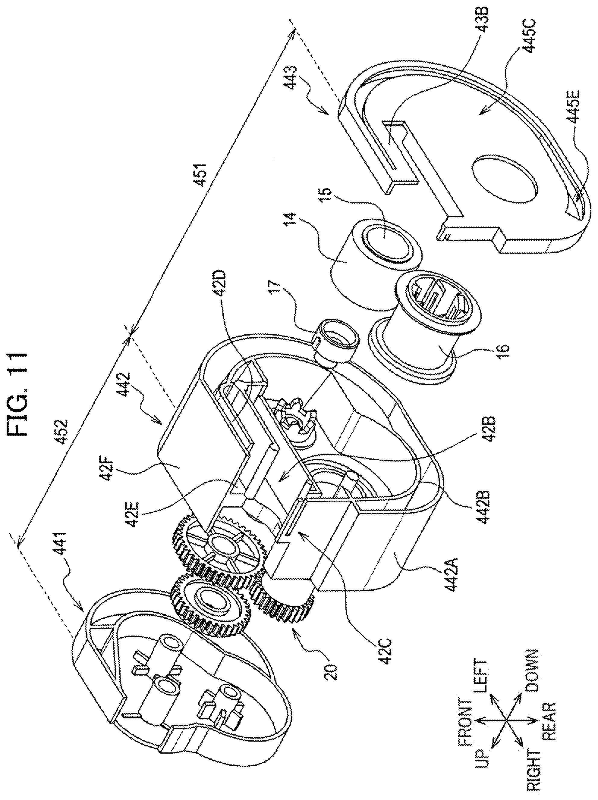 Patent US12576656 Figure 11 – Auxiliary tape cassette including auxiliary tape, gear, and case that accommodates therein at least a part of auxiliary tape and at least a part of gear