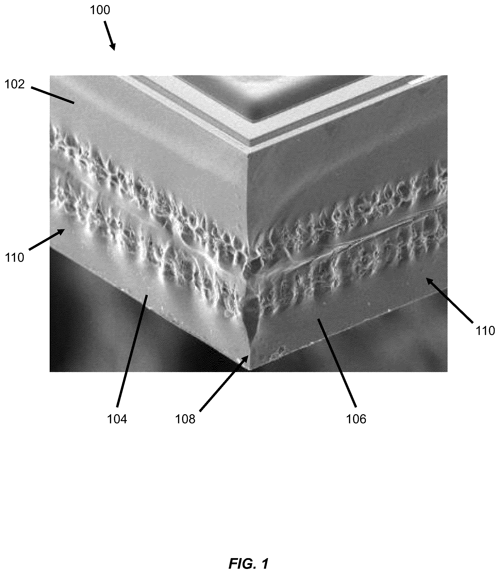 Patent US12581888 Figure 1 – Singulated semiconductor device including a layer modification offset from a corner thereof and methods for forming the same