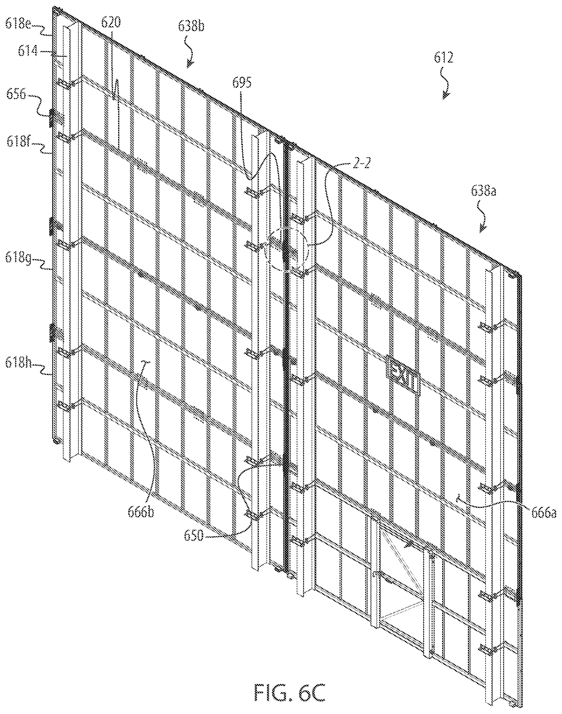 Patent US12612779 Figure 12 – Articulated perimeter wall for an industrial worksite