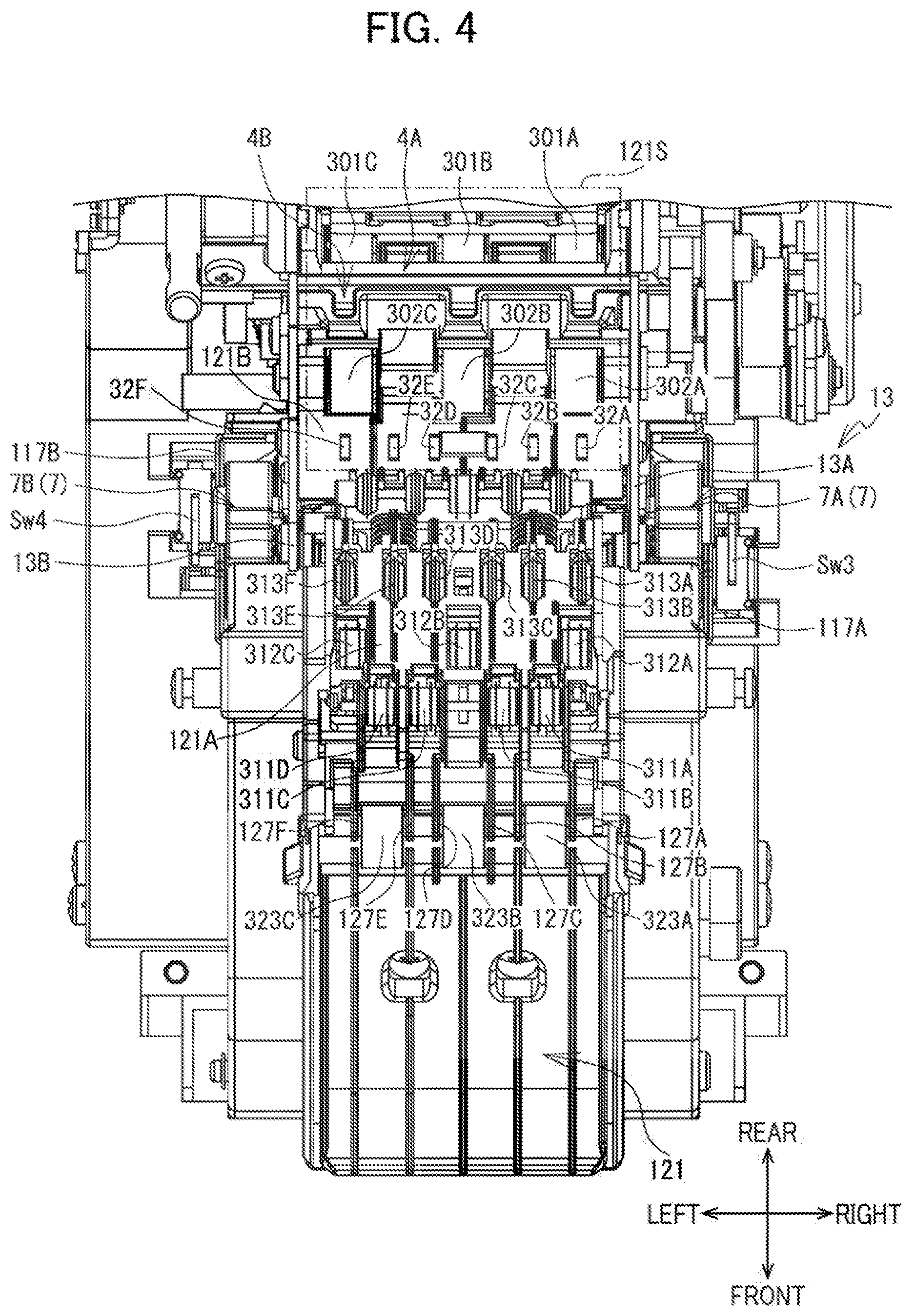 Patent US12617575 Figure 4 – Label affixing device including peeling part peeling label off release material, affixing part affixing label to adherend, and discharge part through which release material is discharged