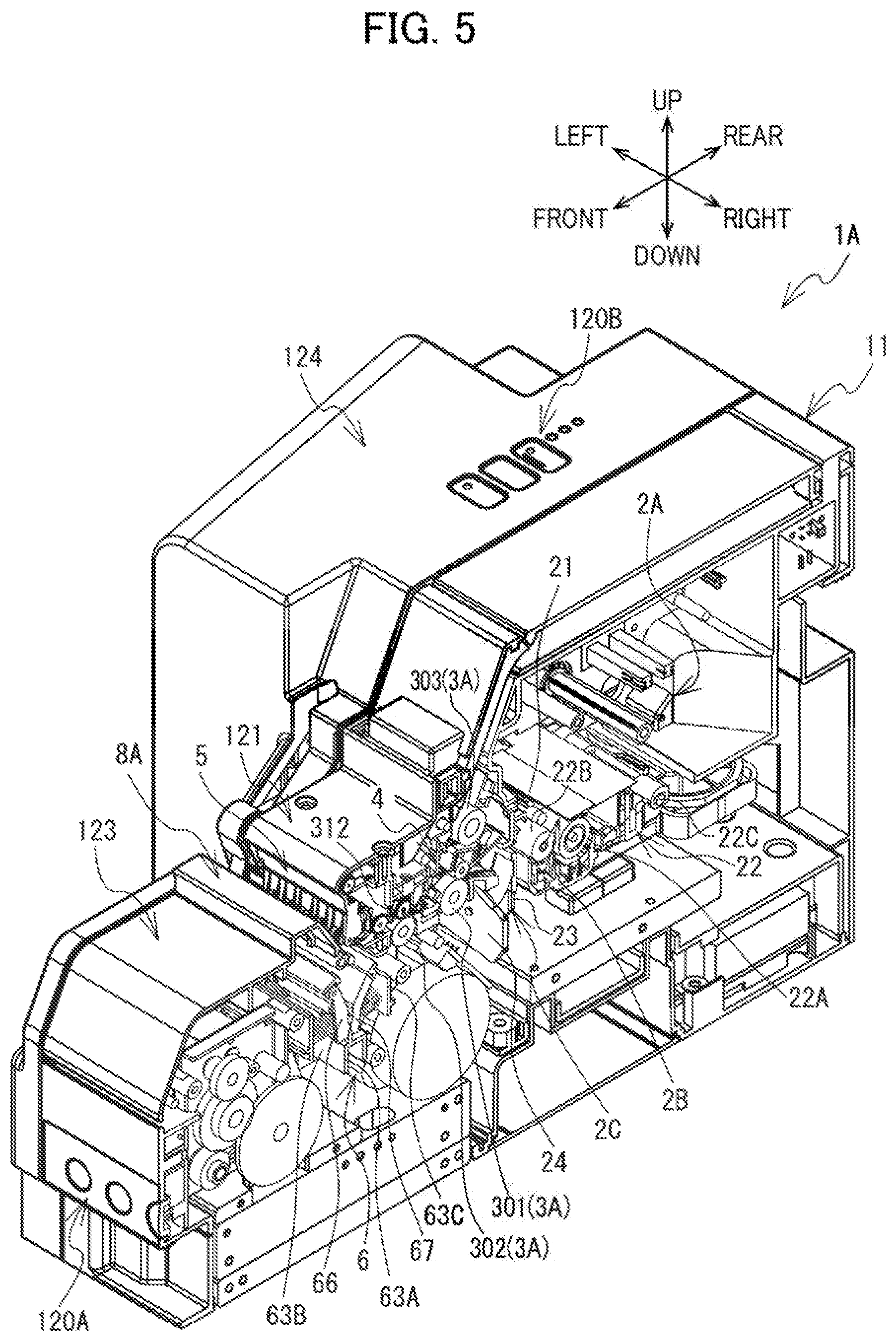 Patent US12617575 Figure 5 – Label affixing device including peeling part peeling label off release material, affixing part affixing label to adherend, and discharge part through which release material is discharged